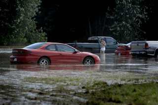 Illustration for article titled Michigan Fairground Floods, Waterlogging Hundred Of Cars